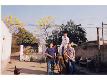 Resting after working on a tree. On top is Elder Robinson. From left to right are Elders McNabb and Diamond. Seen behind is Sergio. The picture was taken in Tucuman (the Universitano area).
Bryan C. Robinson
24 Nov 2001