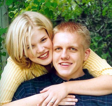 This is a picture of my Princess and me, taken back in June.  She's a professional photographer, so we took some mock engagement pictures this day for fun, we may even use this one for our announcements.
Weldon L Hathaway
02 Sep 2003