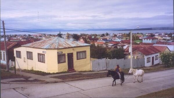 A typical scene of a street and coastline in Puerto Natales.
Nick Barrett
31 May 2006