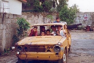 Not truly a mission car.  These children would always be playing around our house.  I just thought this was the perfect background for a picture with them.
Nomar  Acevedo
05 Sep 2002