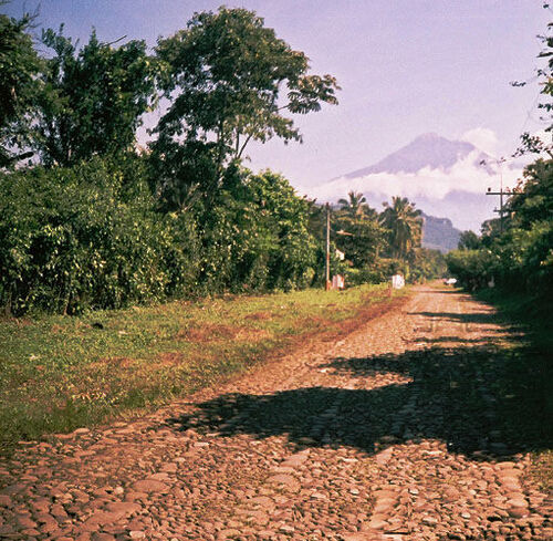 Volcan Tajumulco from San Isidro, Malacatan.  The San Isidro chapel is back by the palm trees.  This picture doesn't do the mountain justice, but it dominates the horizon from here.
Brendon M Melander
14 May 2004