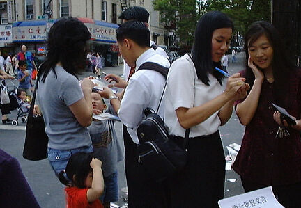 Members joining the missionaries in a street meeting on 8th Ave in Brooklyn.
Ether  Ling
20 Apr 2001