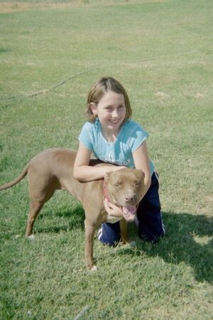 Michelle age 10 playing with our dog in the backyard Safford AZ
Juli  Weatherhead
13 Aug 2005