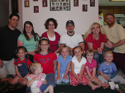 Thought I'd post an update photo. Jeff Haddon, Brian Dalley and I (Jeremy Whitted) all spent two months together in Marignane (Jeff and I were comps). We've all lived in Boise together for several years, so here's a shot of all three families before the Haddon's move to South Bend this summer. Adults (left to right): Jeff and Kimber Haddon; Kelly and Brian Dalley; Stephanie and Jeremy Whitted. Children (left to right): Kelly, Erin and Kara (in front) Haddon; Morgan and Macenzie Dalley; Samantha and Maxwell Whitted. (Apologies to the Haddons and Dalleys for any misspellings.)
Jeremy  Whitted
27 Jun 2005