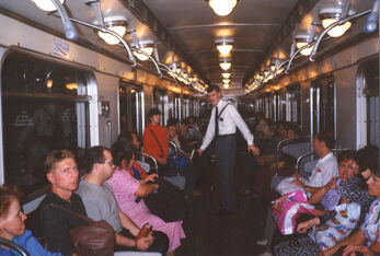 Greenies stand facing front to back and fall over when not holding to the metro handrail.  Showing how to surf the metro in Kiev.
Rex  Griffiths
10 Apr 2005