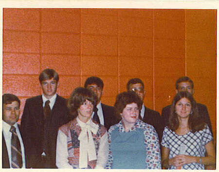 Front Row L to R:  Sisters Mary Burkman & Terry Ward.
Sister Burkman  and I was from the same small ward here in California.  Elder Tim Anderson also from our ward served in the Washington DC Mission from '77 - '79
I don't know who any of the others are.
Michael Kim Wilson
18 May 2004