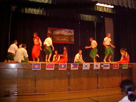 August 2001  -------Asian Cultural Night------
Those four Viet Elder...  ...like to burn their tongue.  Look like they stick dance too good.
Christopher A. Johnson
04 Mar 2002